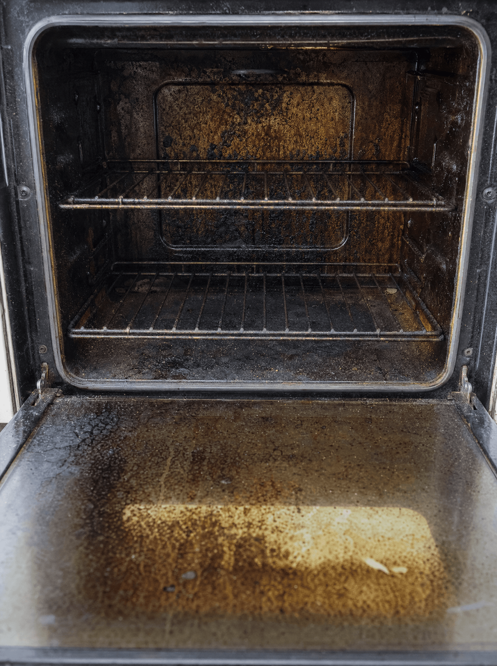 Oven interior before a professional OvenGleam clean in Brisbane